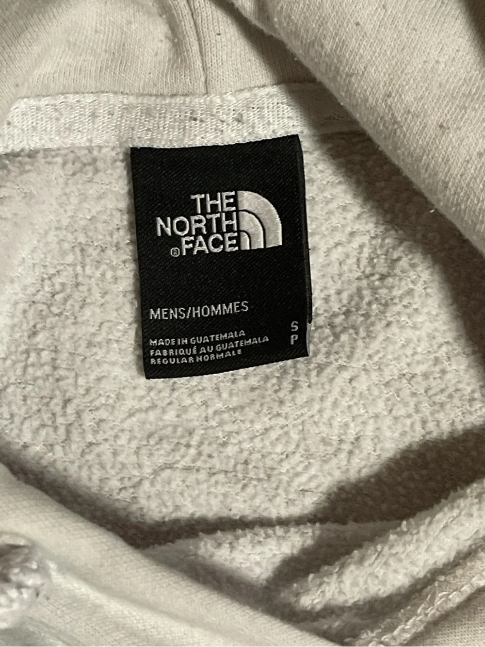 The North Face white hoodie in size Mens S